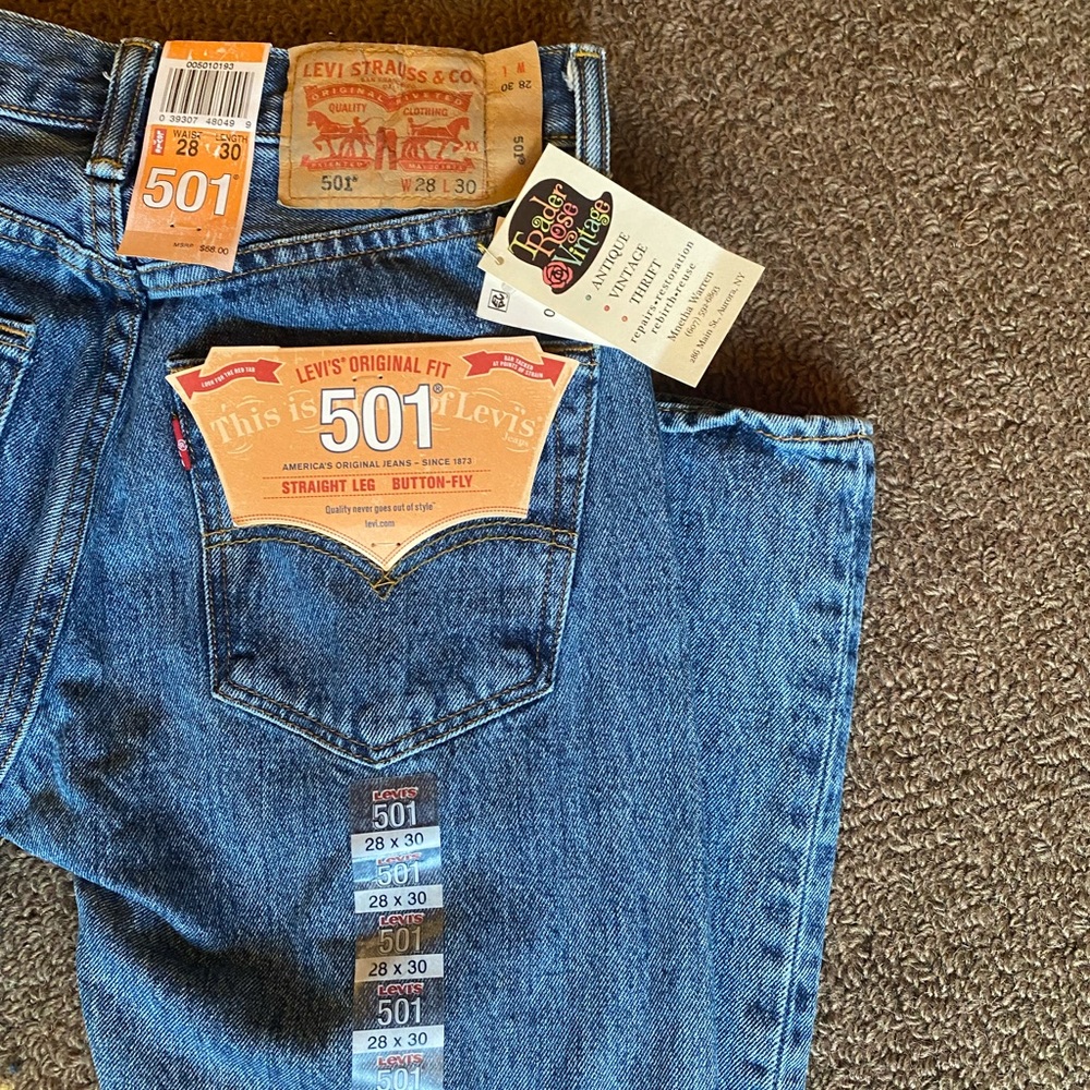 Never worn. Old stock 00s 501s. Button fly. Thrifted in Aurora NY.